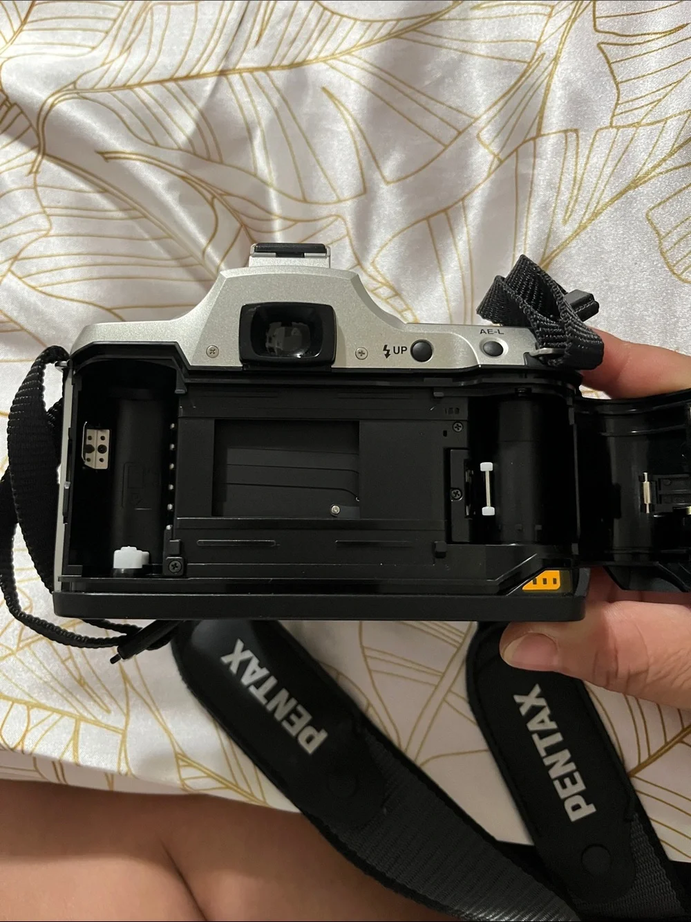 Pentax Silver and Black DSLR with 28-90mm Zoom Lens and Branded Strap